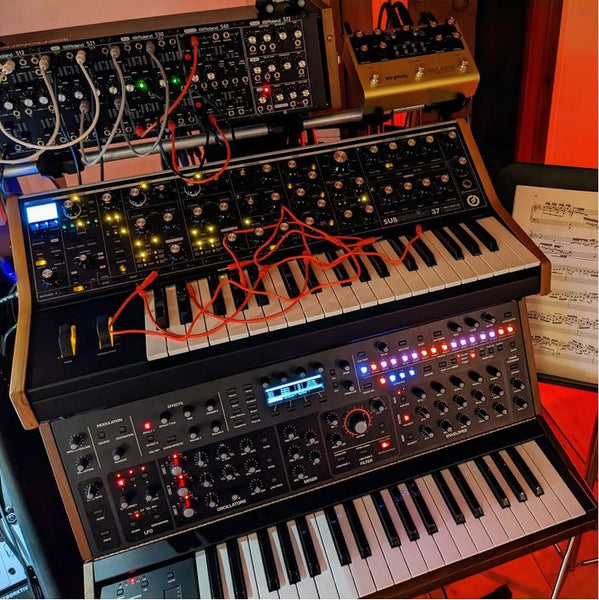 KVgear SubPiggy stand fits Moog Sub 37 and can hold a Roland System-500 Eurorack system plus a strymon pedal.