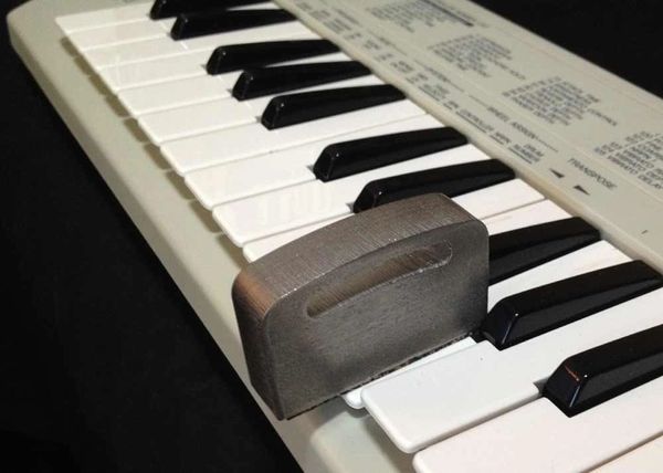 Keyboard weight on MIDI minikey controller