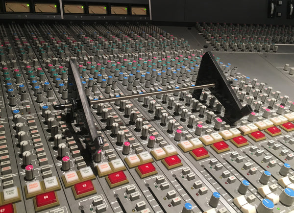 Adjustable-width stand for holding gear on any mixing console, even at AIR Studios in London! (KVgear Stiletto Angled)
