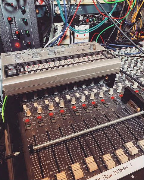 KVgear Stiletto Flat stand holds a TR-606 on a mixer in Hainbach's studio