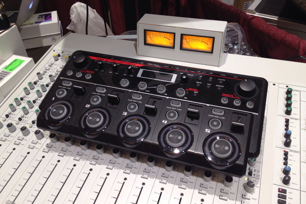 RC-505 looper on top of KVgear Stiletto Flat stand, allowing it to fix on top of a mixer.